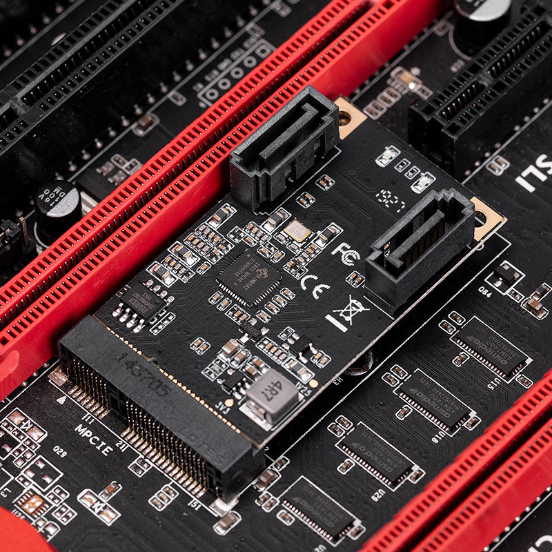 Mini PCI-E SATA card installed in laptop expansion slot
