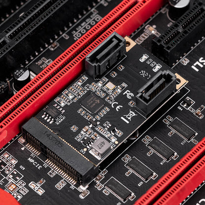 Mini PCI-E SATA card installed in laptop expansion slot